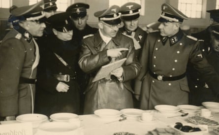 Himmler inspecting Allach porcelain at Dachau on 20 January 1941.