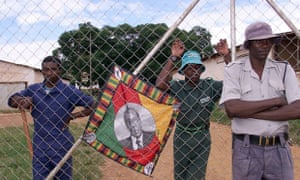 Squatters and police at Zimbabwe farm