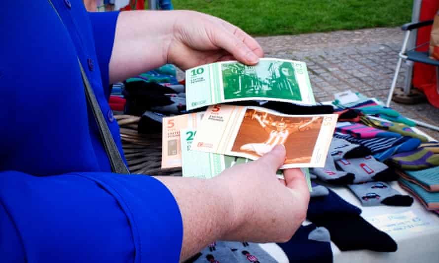 Local currency in use at the launch of the Exeter pound