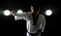 young man doing taekwondo