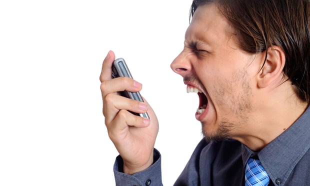angry man shouting at mobile phone
