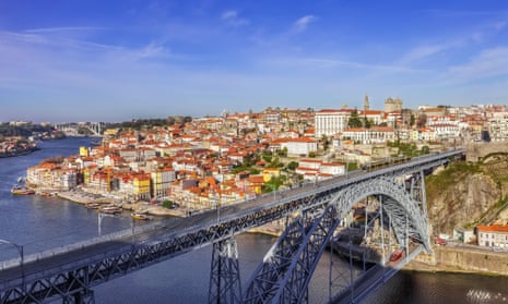 |T|he iconic Dom Luis I bridge crossing the Douro River.