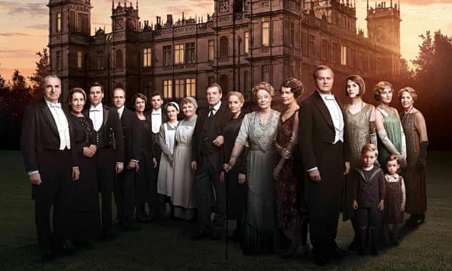 Downton Abbey cast in front of Highclere Castle