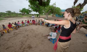Volunteer teaching African children