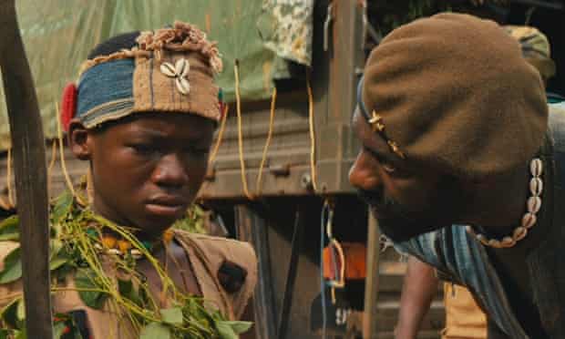 Left to right, Abraham Attah and Idris Elba in Beasts of No Nation.