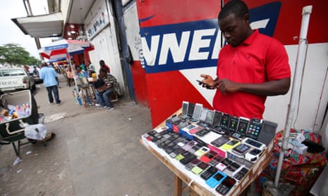 Liberian mobile phone dealers showcase their products in Monrovia