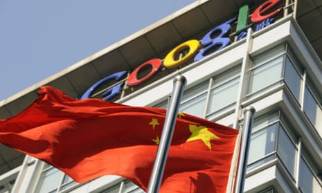 A Chinese national flag flies in front of the Google China headquarters in Beijing