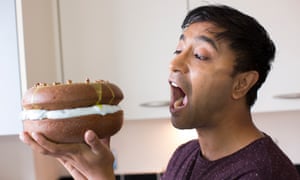 Rhik Samadder eats a giant doughnut cake