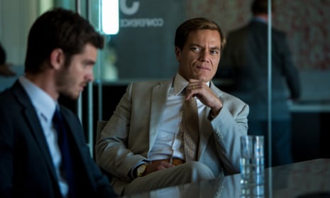 Andrew Garfield (left) as Dennis Nash and Michael Shannon as Rick Carver, in a scene from 99 Homes.