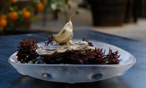 Oysters with garlic at Compartir, Cadaques