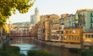 Girona cathedral and the Eiffel Bridge over the Onyar river.
