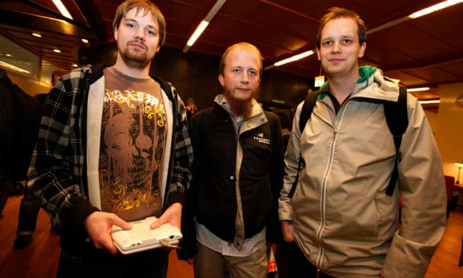 Gottfrid Svartholm, centre, with co-founders Fredrik Neij (left), and Peter Sunde (right), on the last day of their initial trial in 2009.