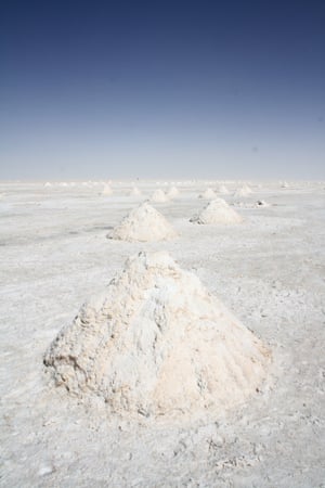 Piles of lithium dug from the Bolivian salt flats lie ready to be collected. The new industry could transform the fortunes of this impoverished country.