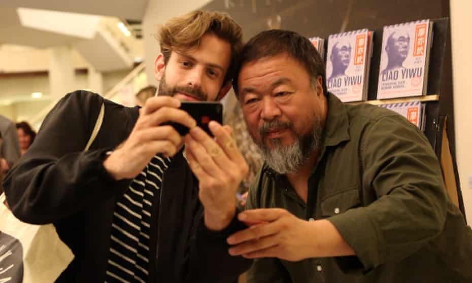 Ai Weiwei poses for a selfie after his panel discussion at the Berlin international literature festival on 2 September.