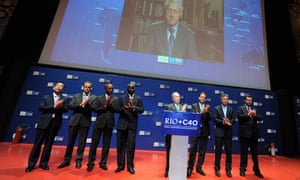 Babatunde Fashola (third from left) shares a stage with Michael Bloomberg of New York and others during the Rio+C40 Mega City Mayors Taking Action on Climate Change event in 2012.