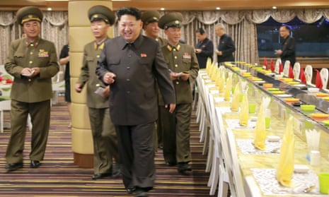 Kim Jong-un inspects a newly built boat in a photo released by North Korea’s official news agency.