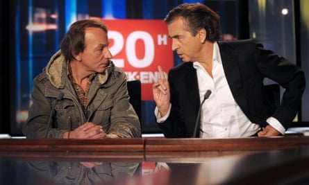 Houellebecq with Bernard-Henri Levy, promoting their book Public Enemies.