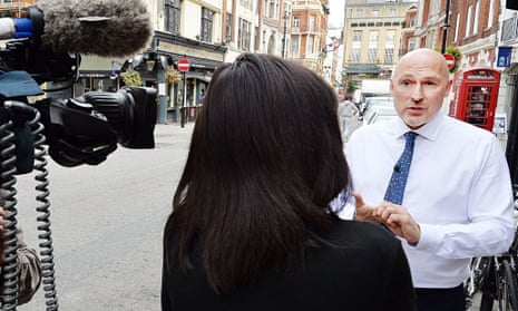 Alan McOwan, Chelsea and Westminster Hospital trust's director for sexual health, speaks to a TV cre