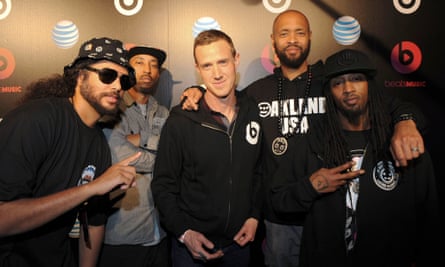 Ian Rogers, centre, formerly of Apple Music and now at LVMH, with the hip-hop group Souls of Mischief.