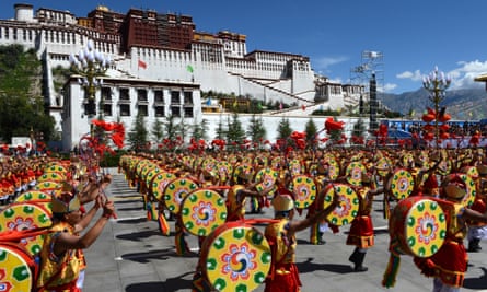 A drum dance phalanx attends a grand ceremony marking the 50th anniversary of the founding of the Tibet Autonomous Region.