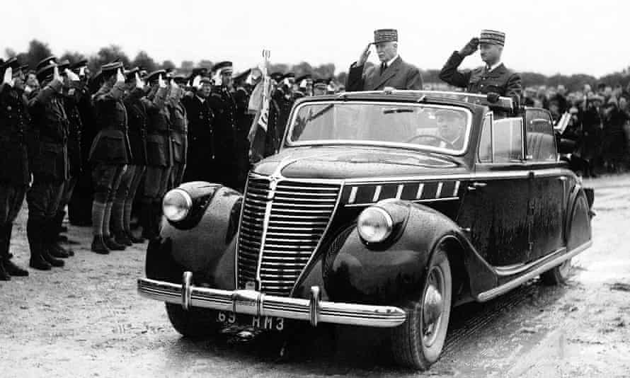 Marshal Petain (on the left) during an inspection at Segry camp near Chateauroux, in Vichy, France, 1942.