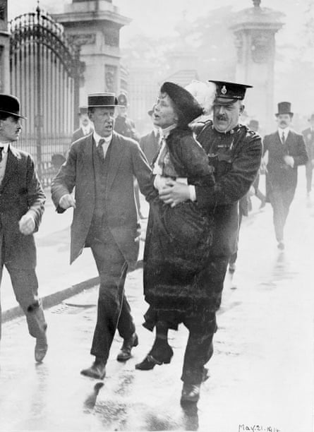 Emmeline Pankhurst being arrested by outside Buckingham Palace, in 1914.