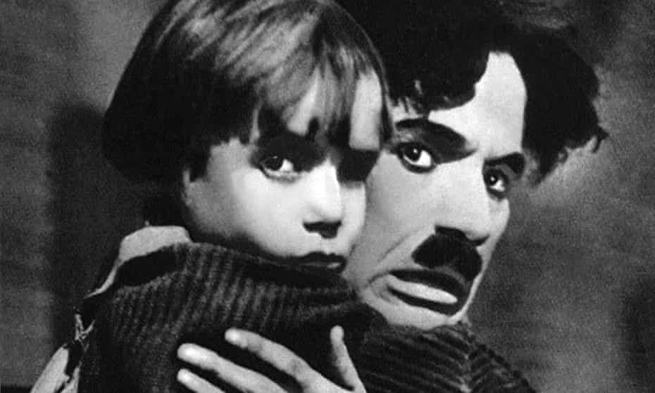 Charlie Chaplin and Jackie Coogan in The Kid.