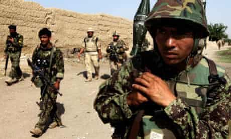 ANA soldier patrols in Arghandab valley near Kandahar