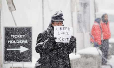 Man in snow outside Sundance film festival