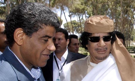Abdullah al-Senussi and Muammar Gaddafi