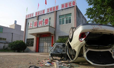 Upturned car in Shangpu, China
