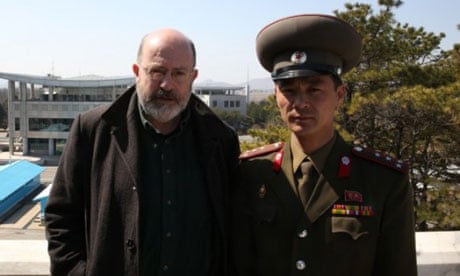 The BBC's John Sweeney poses with a North Korean soldier