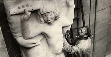  Eric Gill at work on Prospero and Ariel outside the BBC