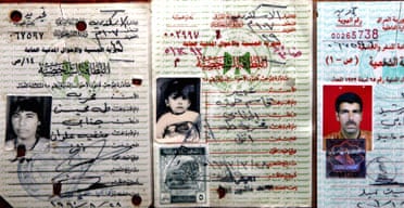 The Iraqi identity cards of Abeer Qassim Hamza al-Janabi, her mother, Fakhriya Taha al-Janabi (l) and her father Qasim Hamza al-Janabi
