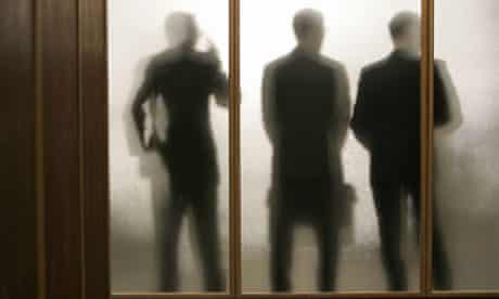 Three of the Mad Men in silhouette