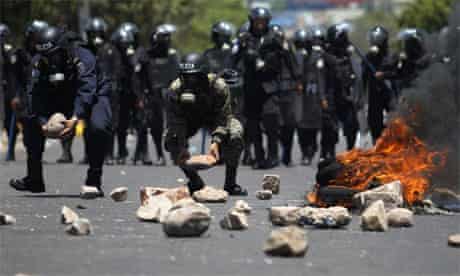 Soldiers and police clash with striking teachers in Honduras, 2011