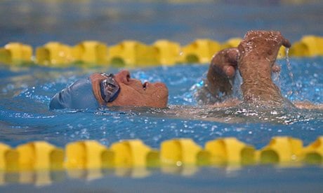Race against time … Jaring Timmerman – who is 100 years old – swims the backstroke.