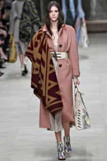 A model wearing a blanket at Burberry Prorsum Ready to Wear Autumn/Winter 2014-15 London fashion
