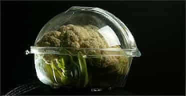  A pre-packaged cauliflower. Fruit and vegetables are coming with increasing ammounts of packaging