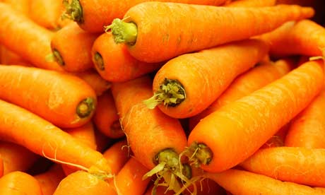 Pile of carrots, raw vegetables