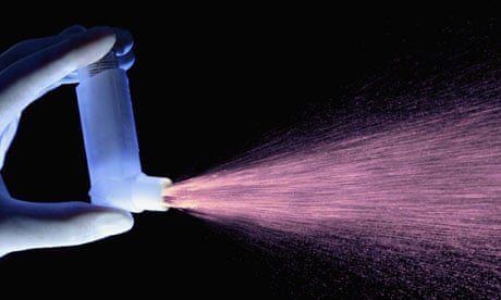 An asthma inhaler dispensing a dose of drugs
