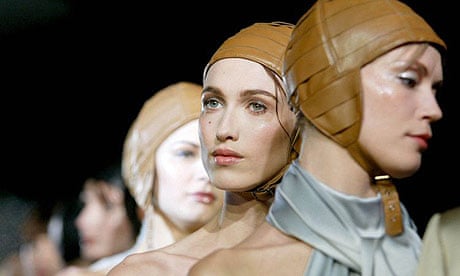 Models wearing leather hats