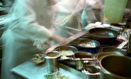 Chefs in a busy restaurant kitchen
