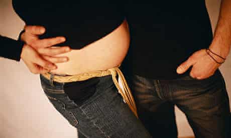A pregnant woman with her partner