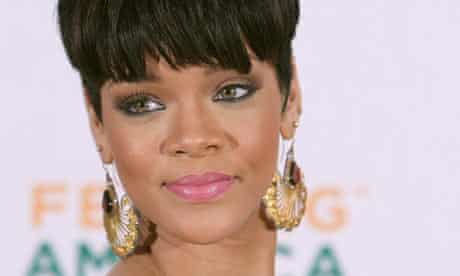 Rihanna wearing big earrings