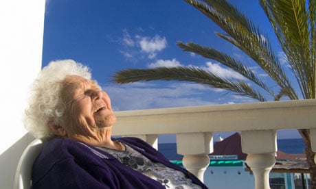 Elderly woman relaxing in the sun