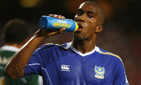 Sylvain Distin knocks back a sports drink during a match