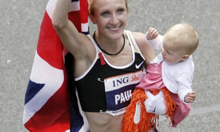 Paula Radcliffe holding her baby after winning the New York marathon