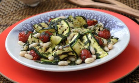 Grilled courgette, tomato and bean salad dressed with basil