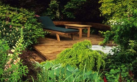 A garden with a raised decking area